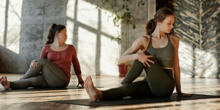 Photo Of Women Stretching Together