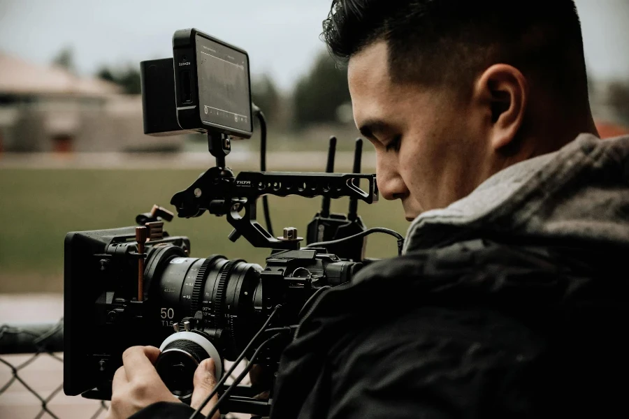 Man Operating a Camcorder