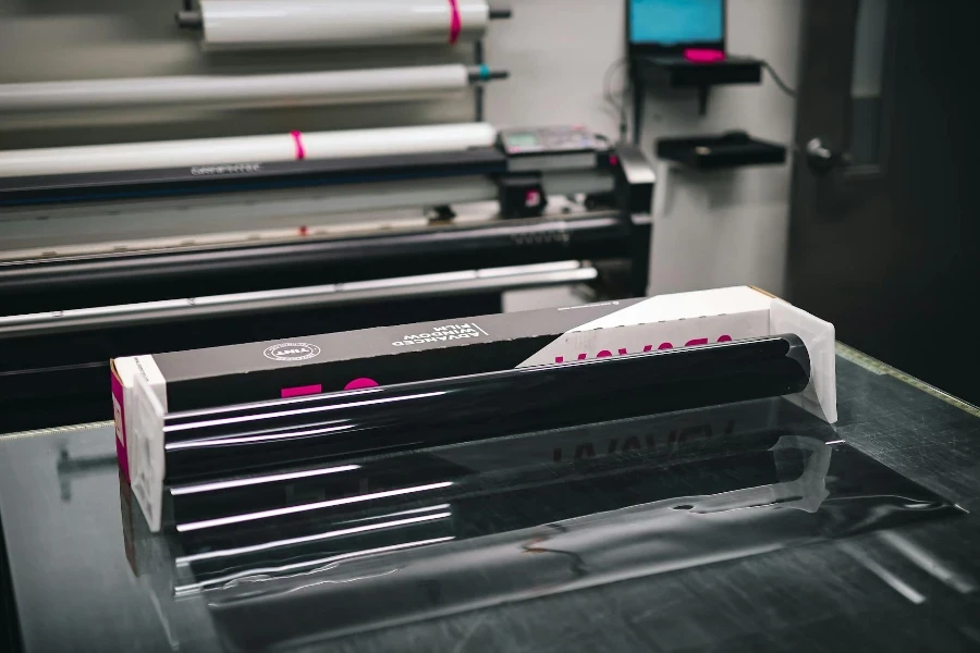 A large printer sitting on top of a table 