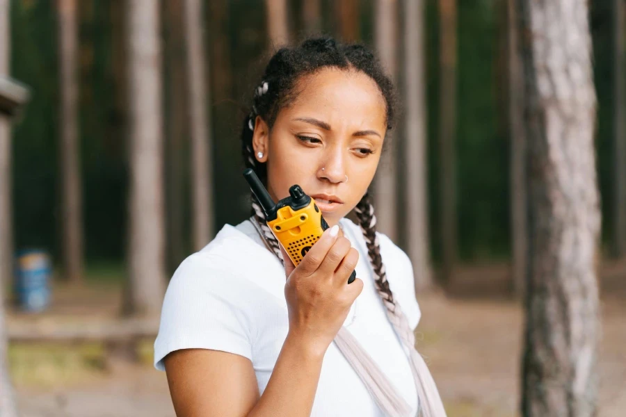 A Woman Using a Transceiver