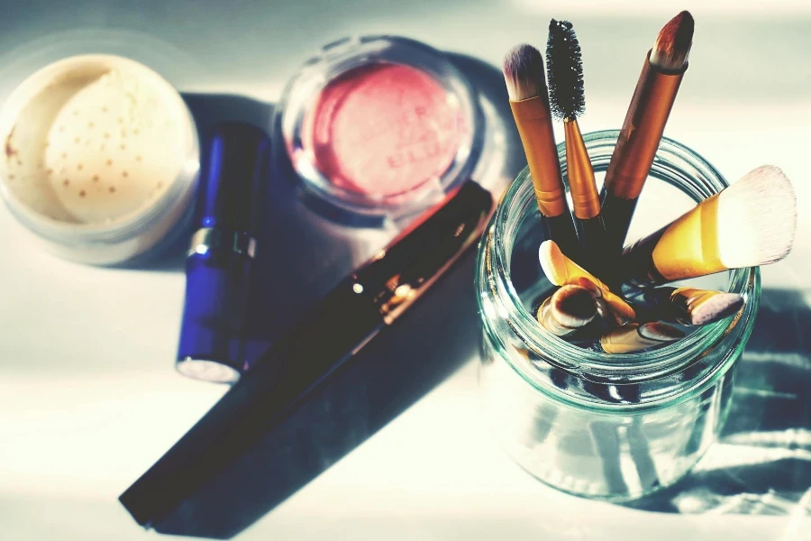 Photography of Makeup Brushes in Jar