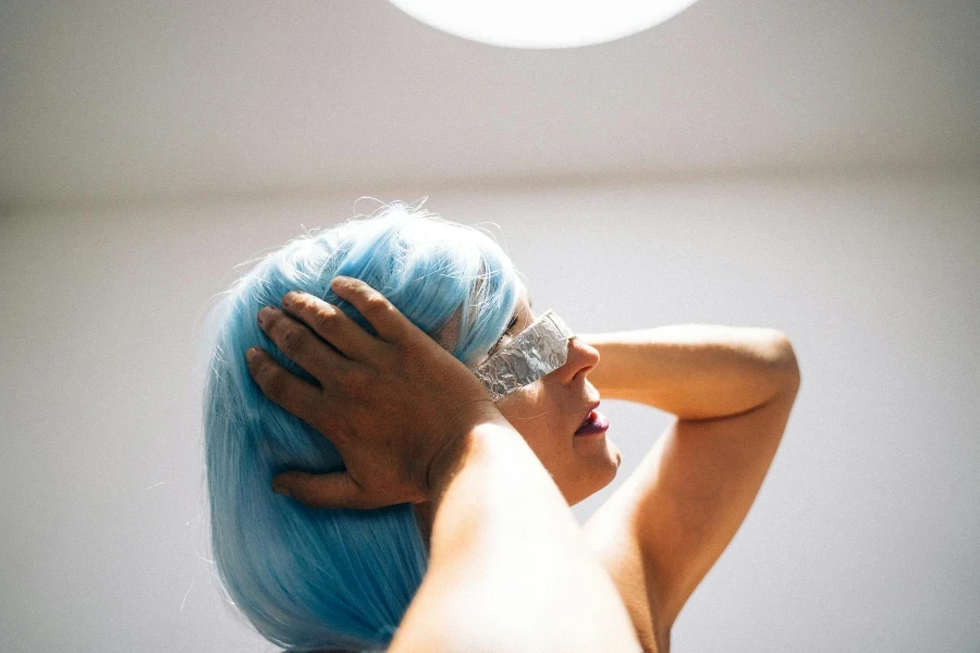 Woman with Blue Hair Looking Up