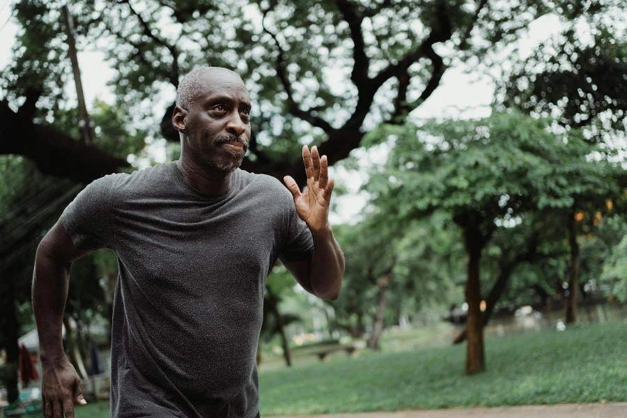 Photo of Man in Gray Shirt