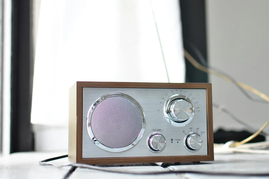 Classic styled radio receiver with chrome buttons and speaker