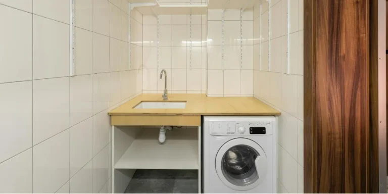 White Washing Machine Under the Table