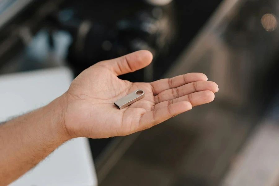 modern portable memory device on palm of hand