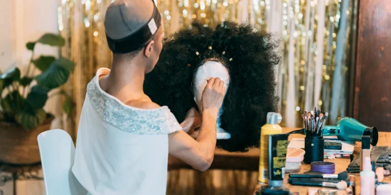 Woman in hairnet with wig stand