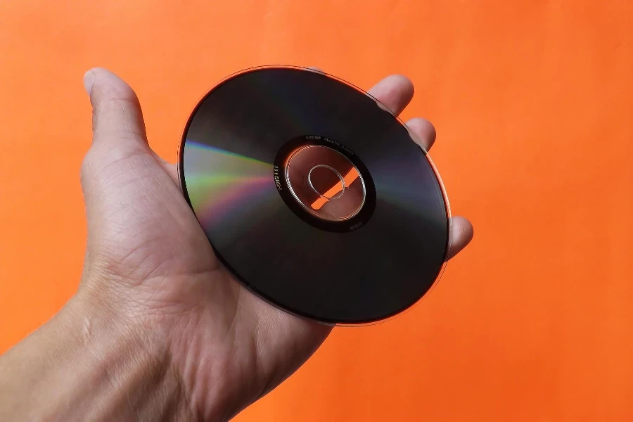 A Person Holding a CD