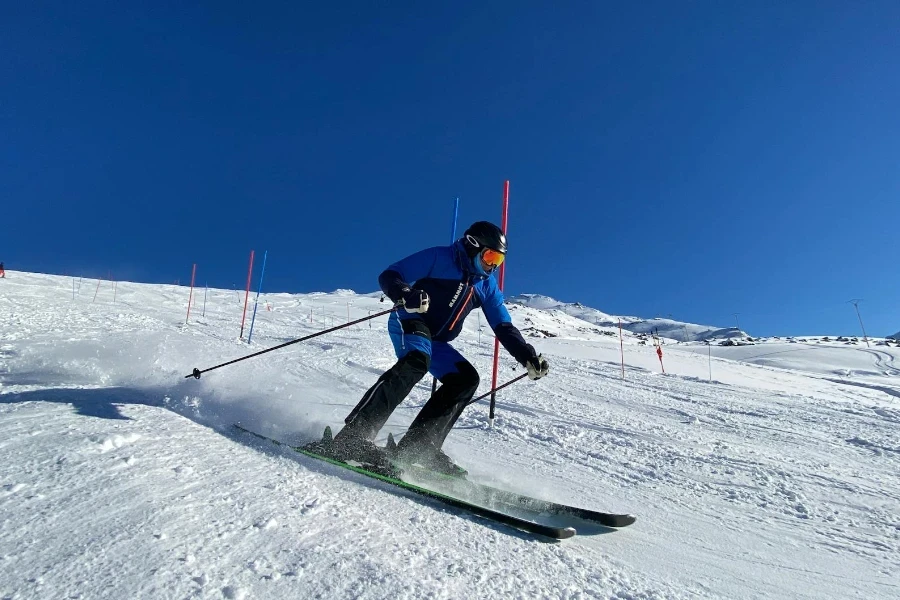 A Person in Blue Snow Boarding Suit