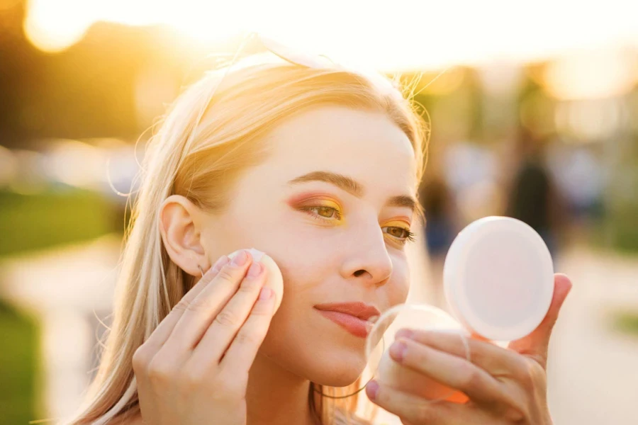 lady putting on makeup