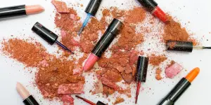 Multiple lipsticks on a white table