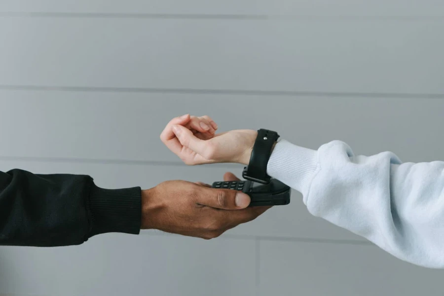 Person using a smartwatch to pay