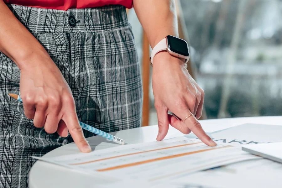 Person wearing a smartwatch while working