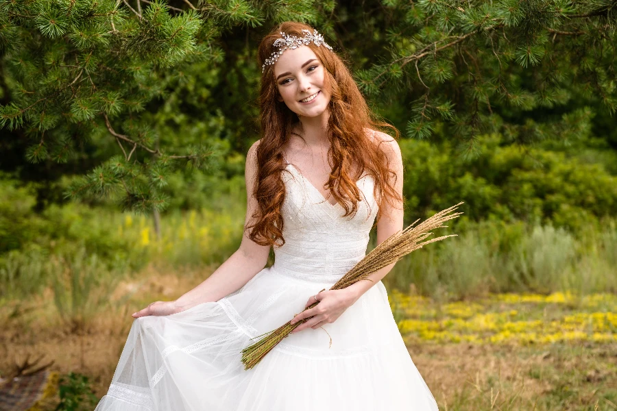 portrait of red-haired bride in the forest