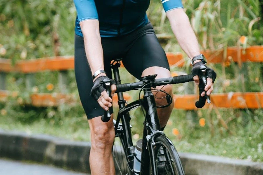 Riders holding their handlebars with gloves on