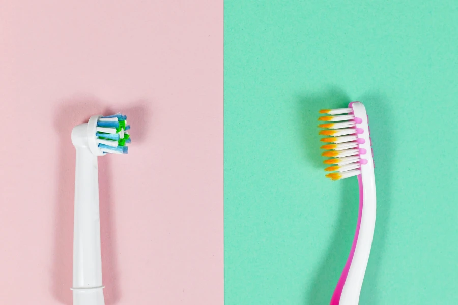 Side-by-side comparison of a manual and sonic toothbrush
