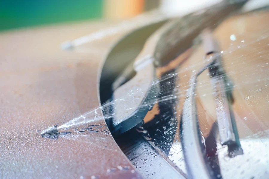 windscreen washer in the process of their work