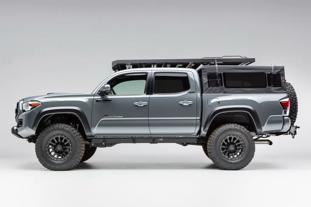 with black accents and an off road rack on the roof