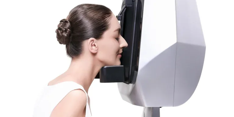 Woman using a skin analyzer