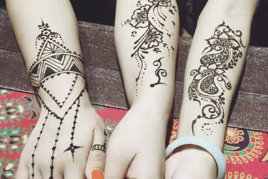 Women showcasing tattoo stencil results