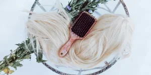Black and White Hair Brush on White and Green Floral Wreath