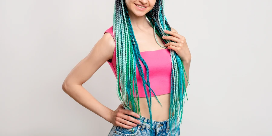 Woman with blue colored braids hairstyle