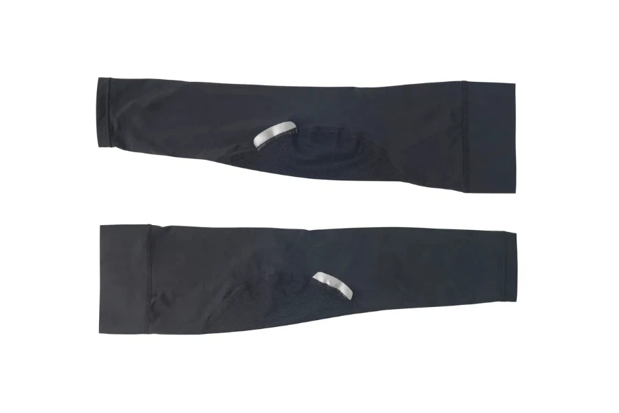 Black arm sleeves with UV protection. Sport gaiters isolated on white