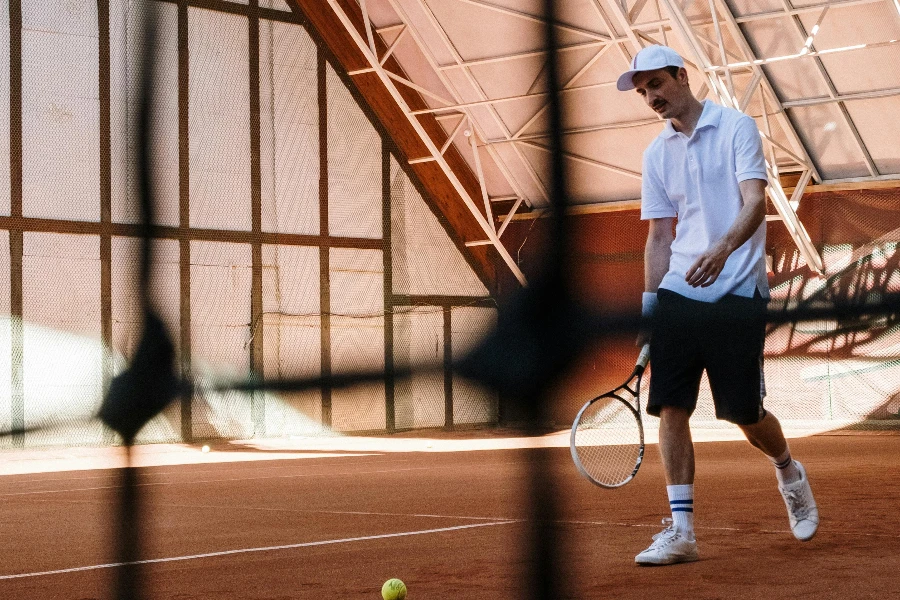 A Man Holding a Tennis Racket