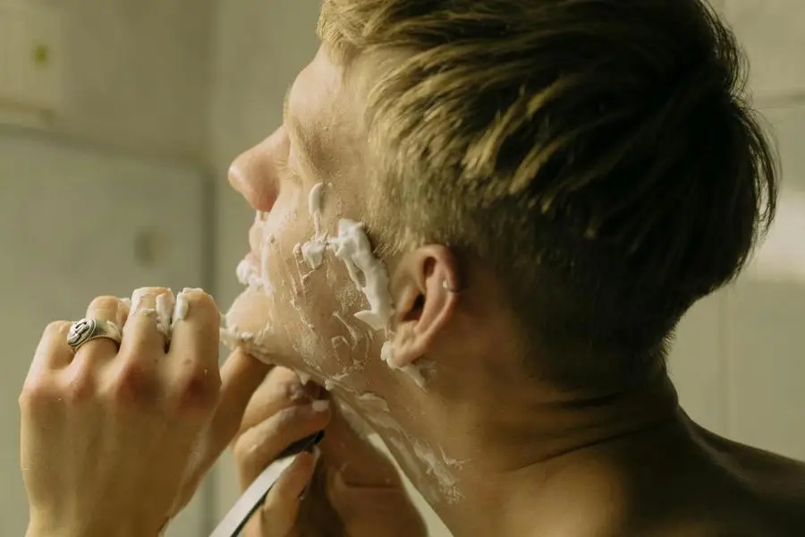 A Man with Shaving Cream on His Face by cottonbro studio