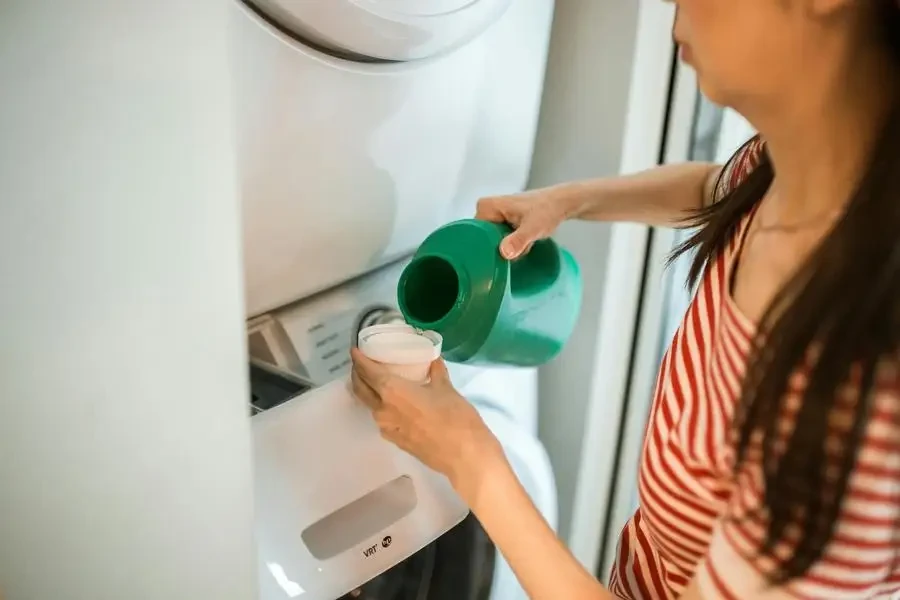 A Woman Pouring Detergent by RDNE Stock project