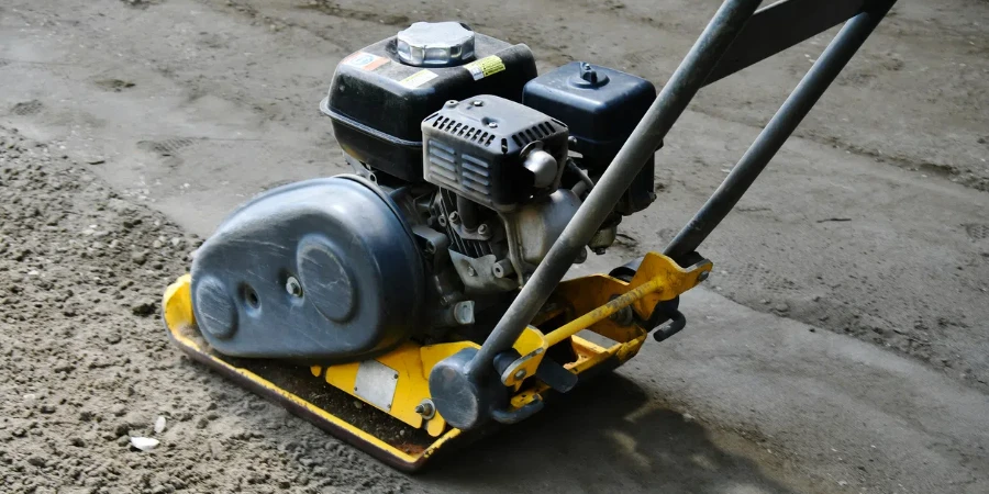 A close up image of a vibrating soil compactor used to compact soil