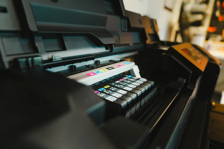 A large printer with cartridges