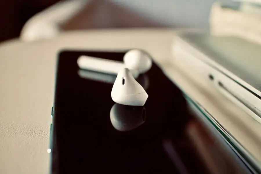 A pair of white Wireless Earbuds