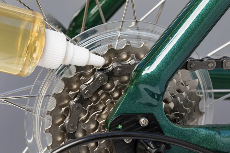 A transparent bottle with bike lube for bike chain
