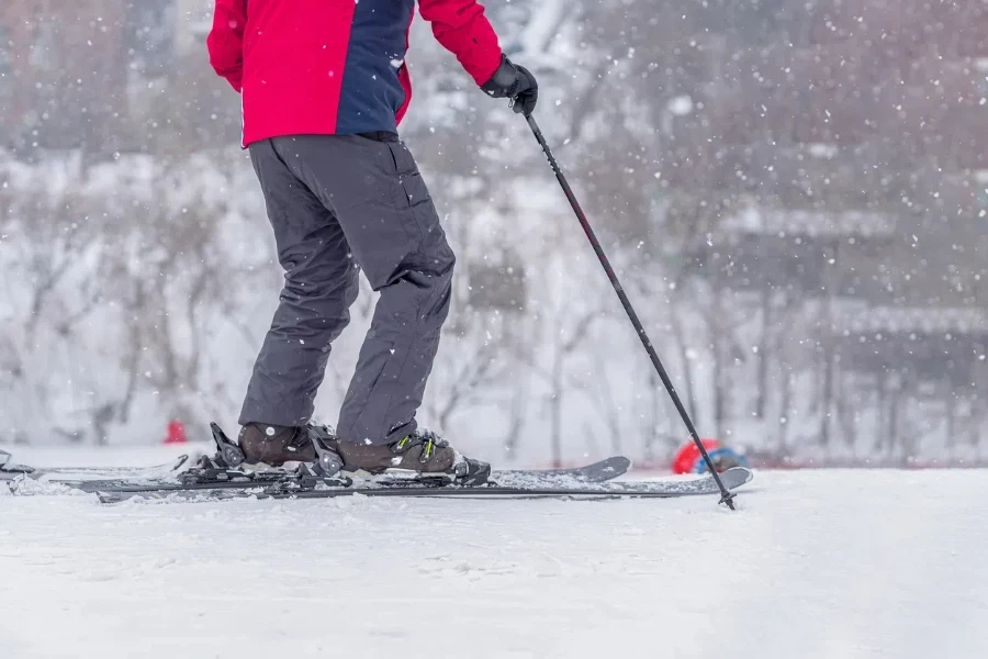 Abstract skier on Ski slope, selective focus. Winter leisure, sport lifestyle and outdoor activities concept