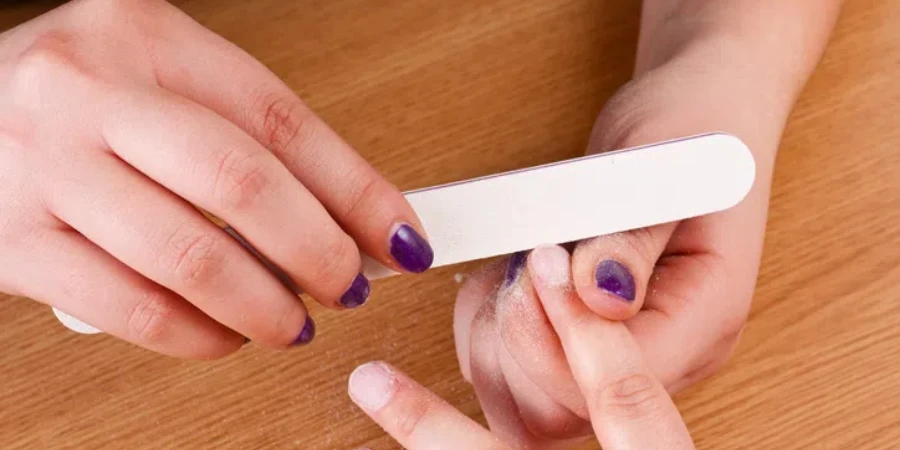 Applying manicure - processing nails