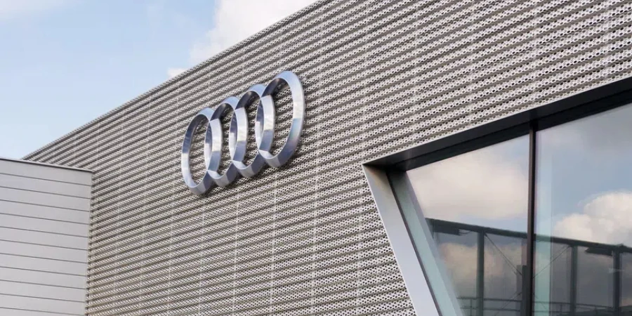 Audi company logo on dealership building