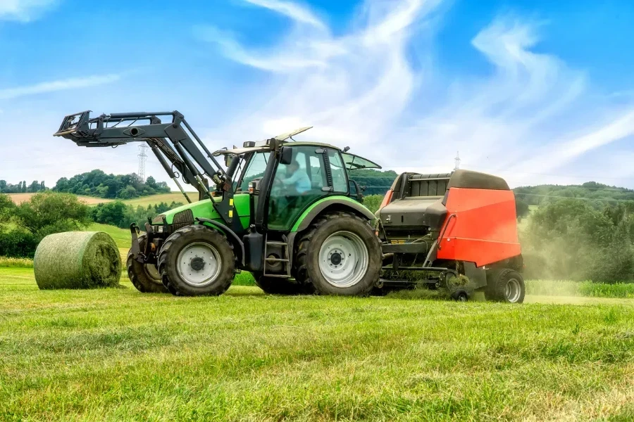 Big baler with film wrapper