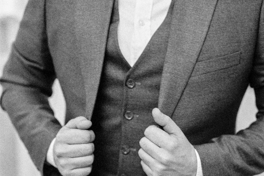 Black and White Photo of Groom in Suit