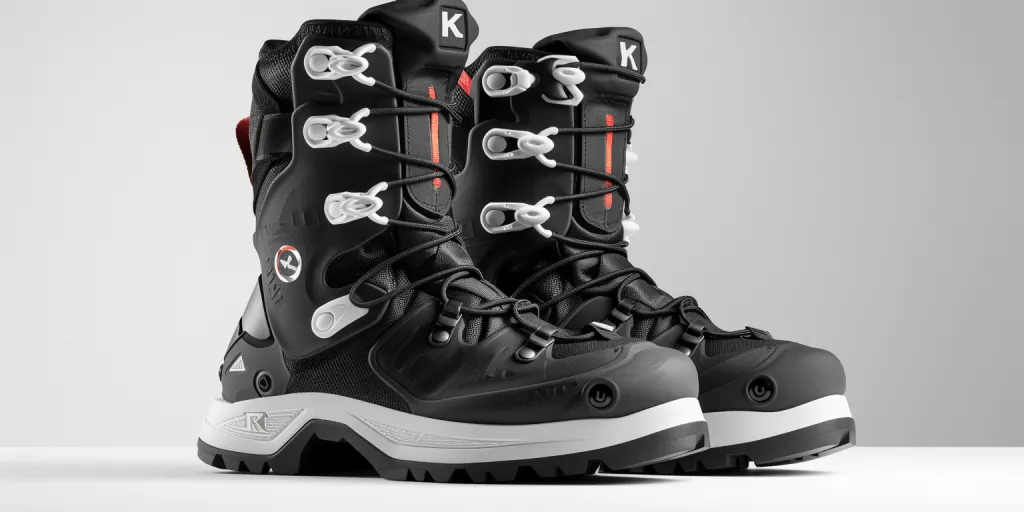Black snowboard boots with white accents