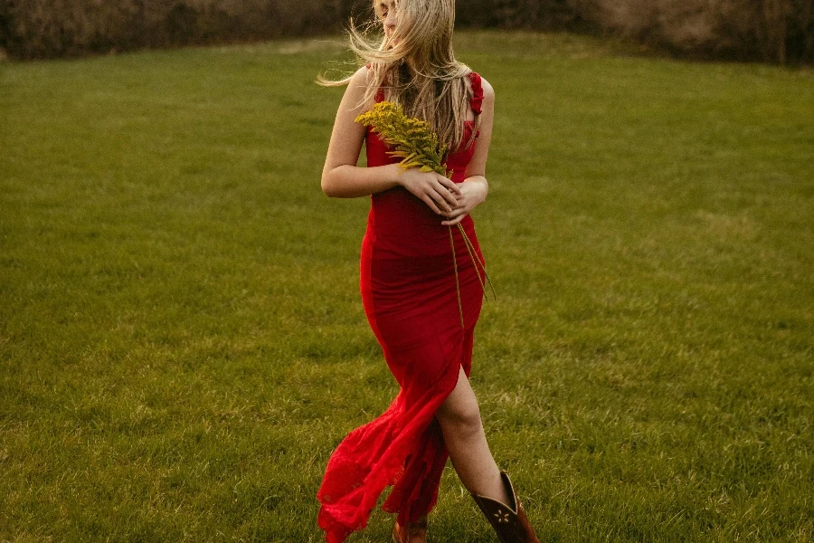 Blonde Girl in Long Red Dress in Spring Park