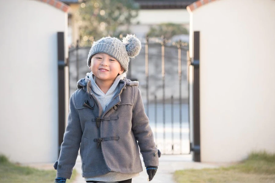 Boy wearing jacket in a neutral color