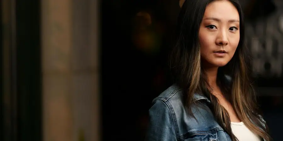 Brunette in Denim Jacket by Conrad Nevins