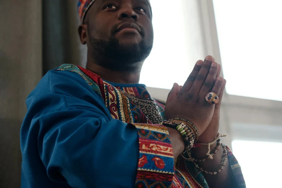 Close-Up Photo Of Man With Praying Hands