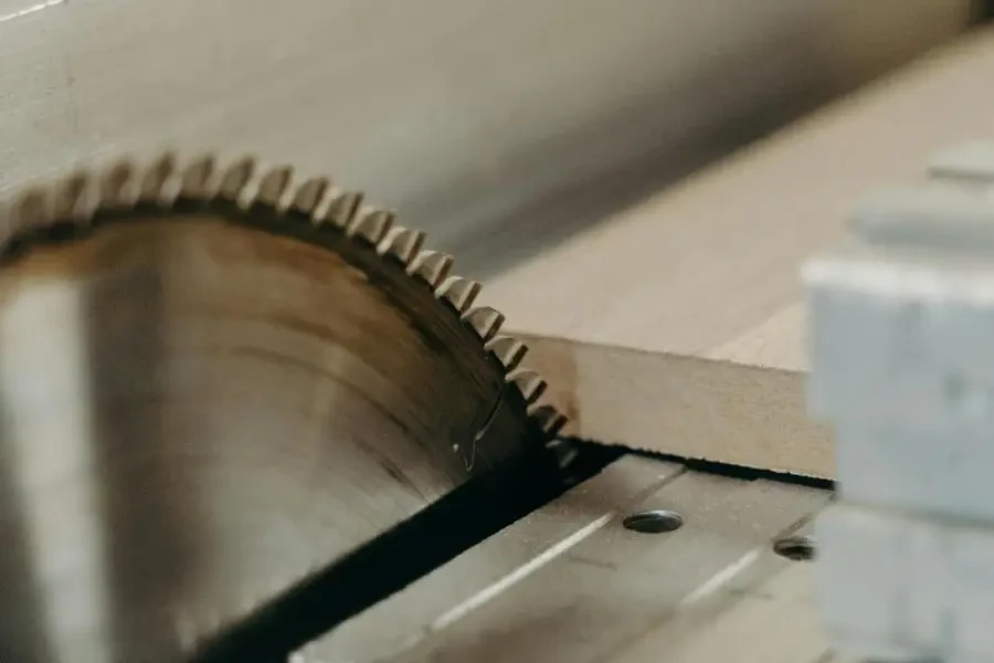 Close-Up Photo of Wood Getting Cut by a Table Saw by cottonbro studio