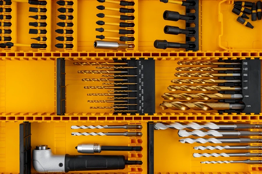 Close-up of Drill bits set professional industrial tools and equipment in yellow box