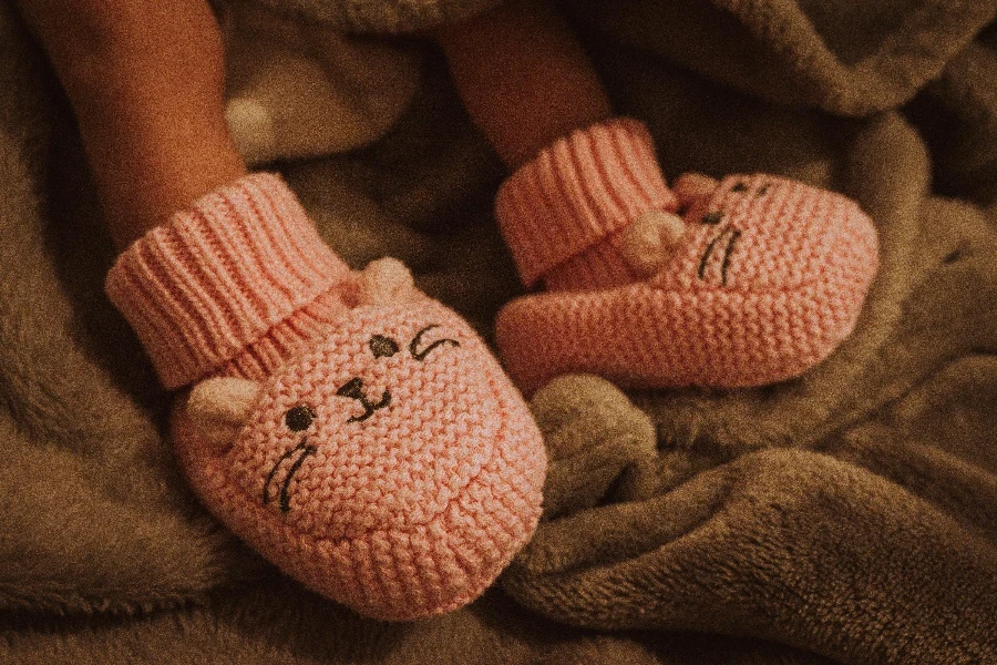 Close-up of a Newborn Baby Wearing Cute Socks