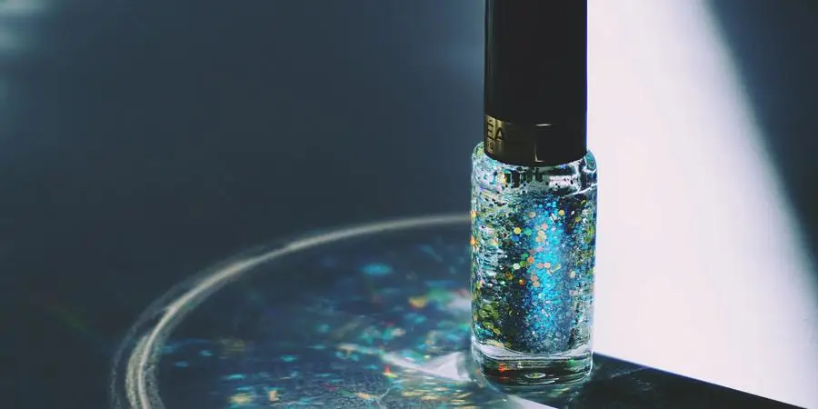 Closed Blue Glitter Nail Polish Bottle by Suzy Hazelwood