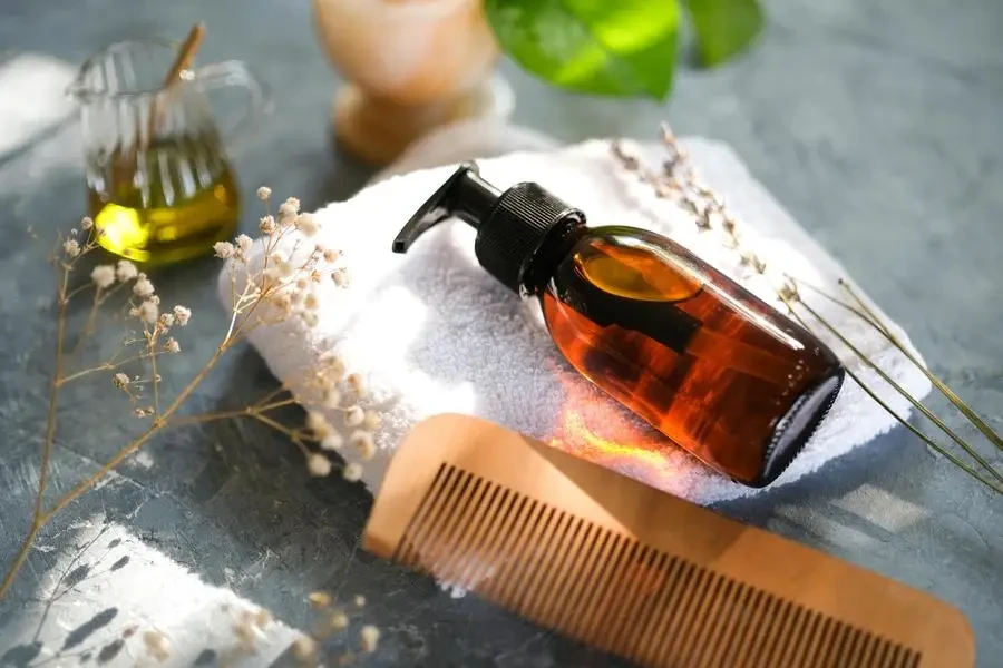 Comb and Bottle of Cosmetic by Tuğba ÖZTÜRK