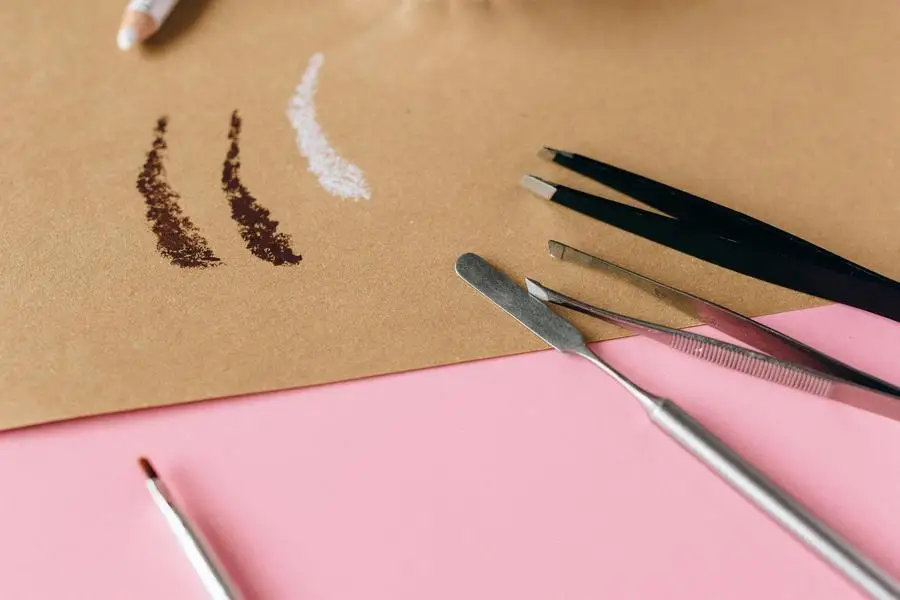 Cosmetic Tools on Pink Surface by Nataliya Vaitkevich